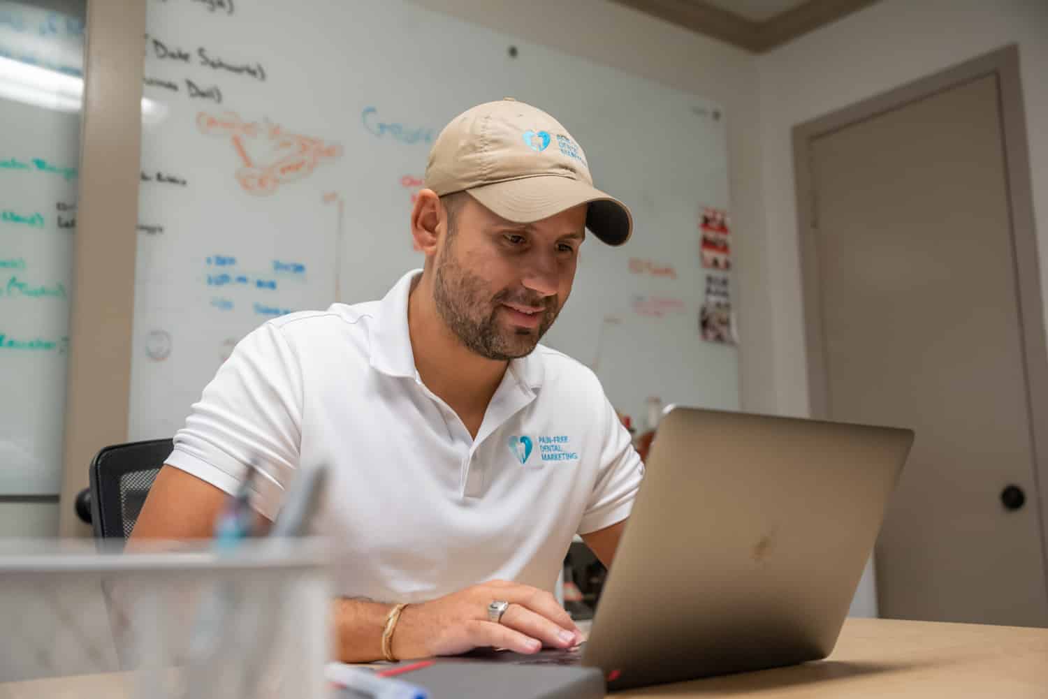 dental marketing expert working on a laptop