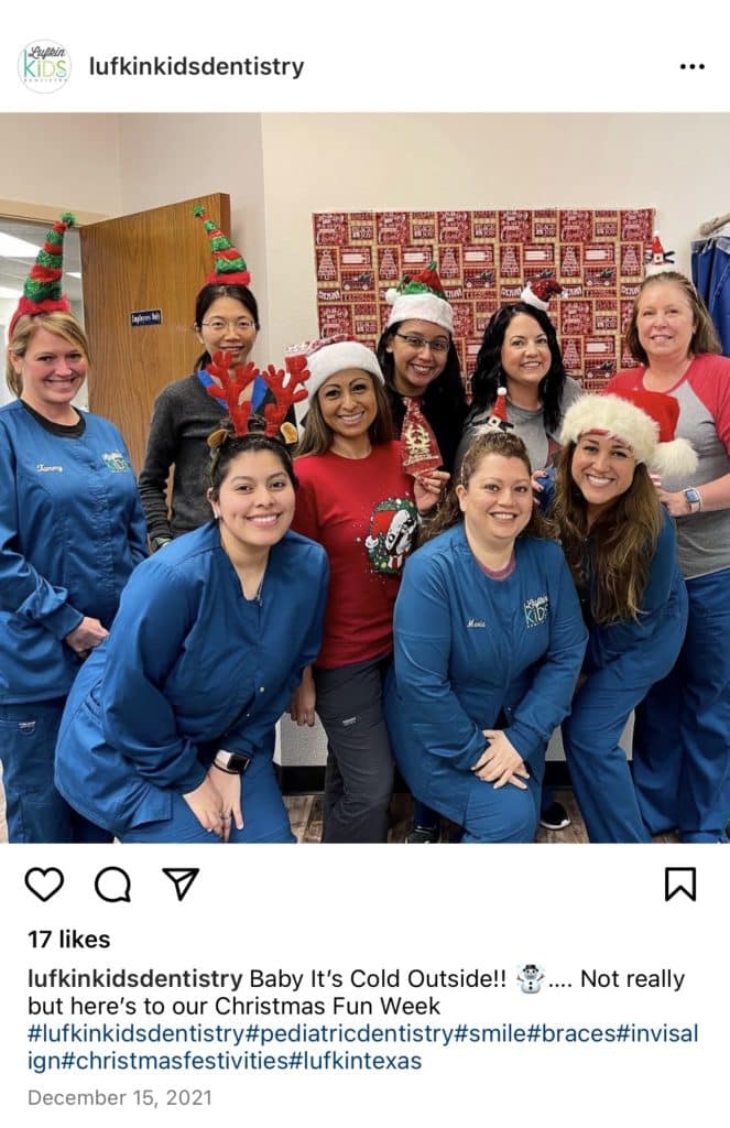 Photo of the team wearing Christmas hats at Lufkin Kids Dentistry